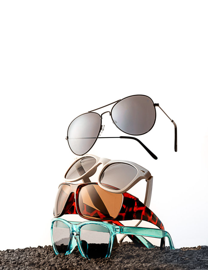 Product Photography of Sunglasses stacked on light background by Joe Cosentino, Utica New York, Visual Media Strategy