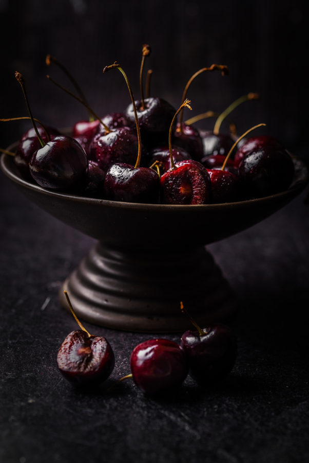 Cherries on Metal Pedestal by Julie L'Heureux Visual Media Strategy