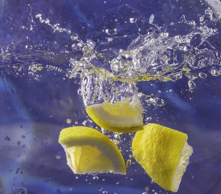 Three Lemons Splashing in Water by Julie L'Heureux Visual Media Strategy