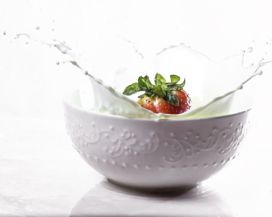 Milk Splash in Bowl with Strawberry by Julie L'Heureux Visual Media Strategy