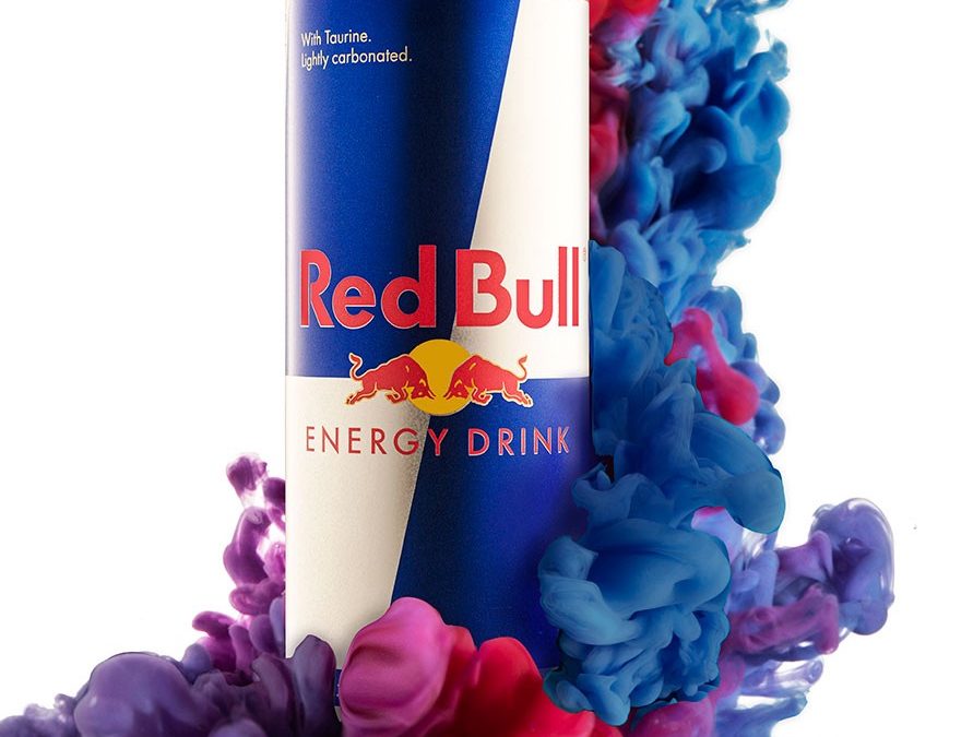 Red Bull surrounded by red and blue acrylic paint