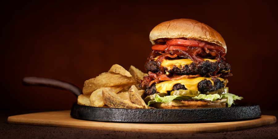 Double Decker Bacon Cheeseburger and Fries on Cast Iron Copyright Bret Doss Visual Media Strategy