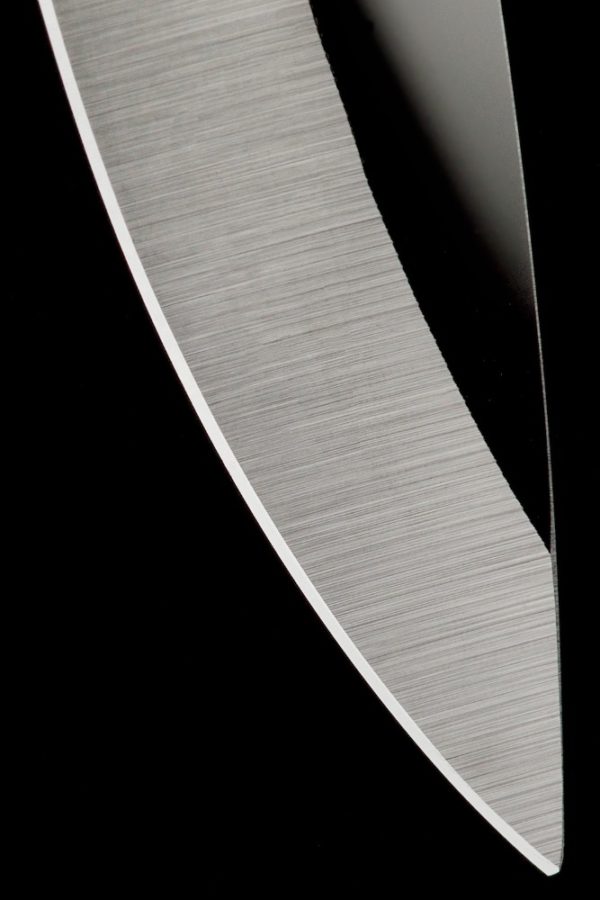 Abstraction Knife Blade Edge on Black Background Copyright Bret Doss Visual Media Strategy